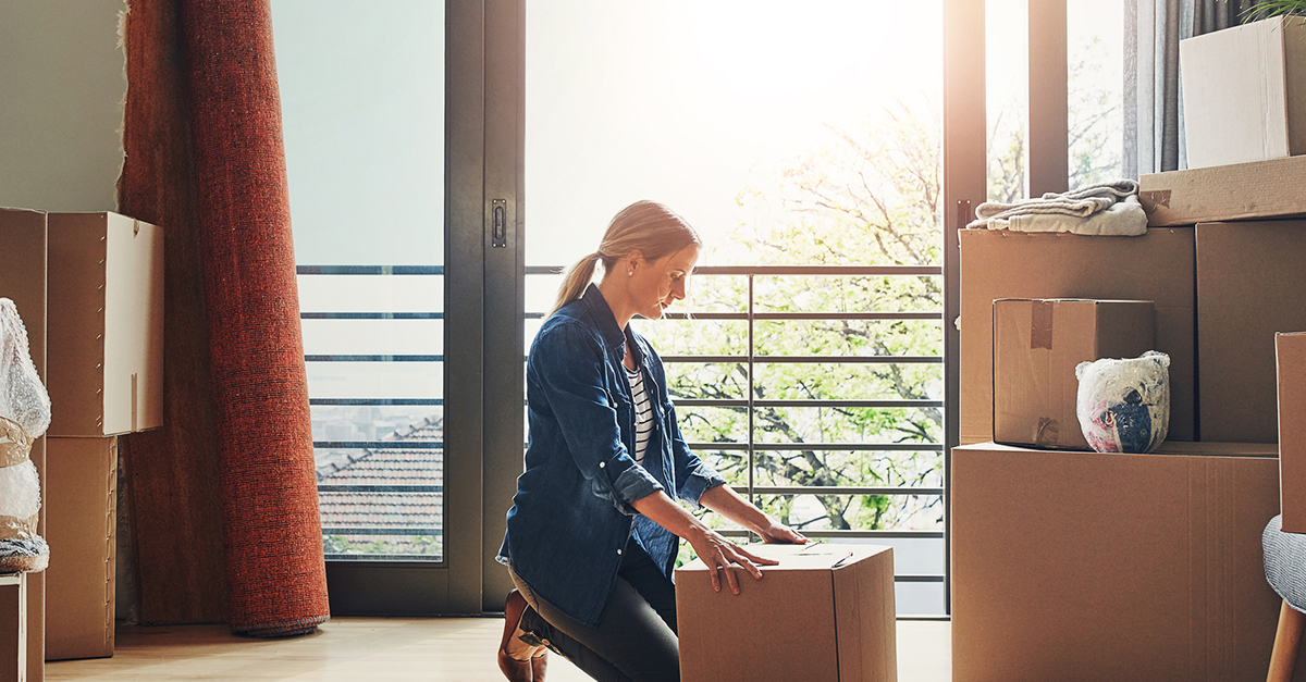 A woman moves into her new home